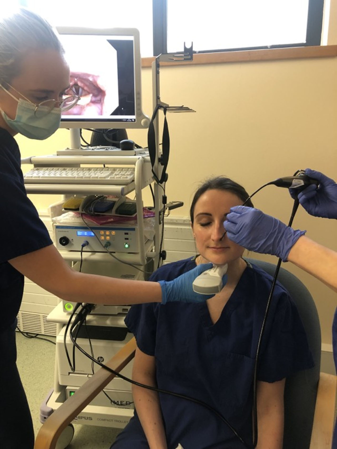 Simultaneous Layngoscopy and TLUS.