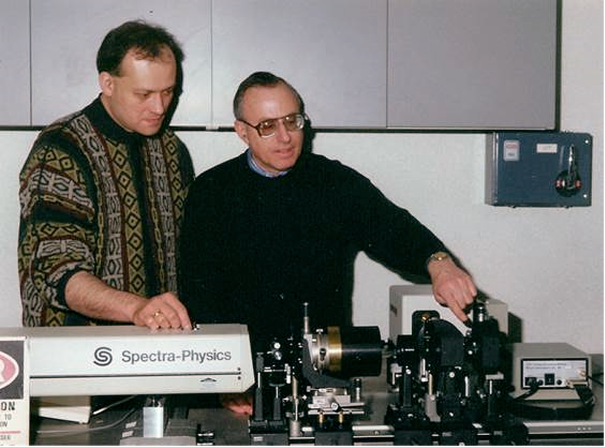 Laurence Barron with his colleague, Lutz Hecht, with their home-built biomolecular ROA instrument at Glasgow University (early 1990s).