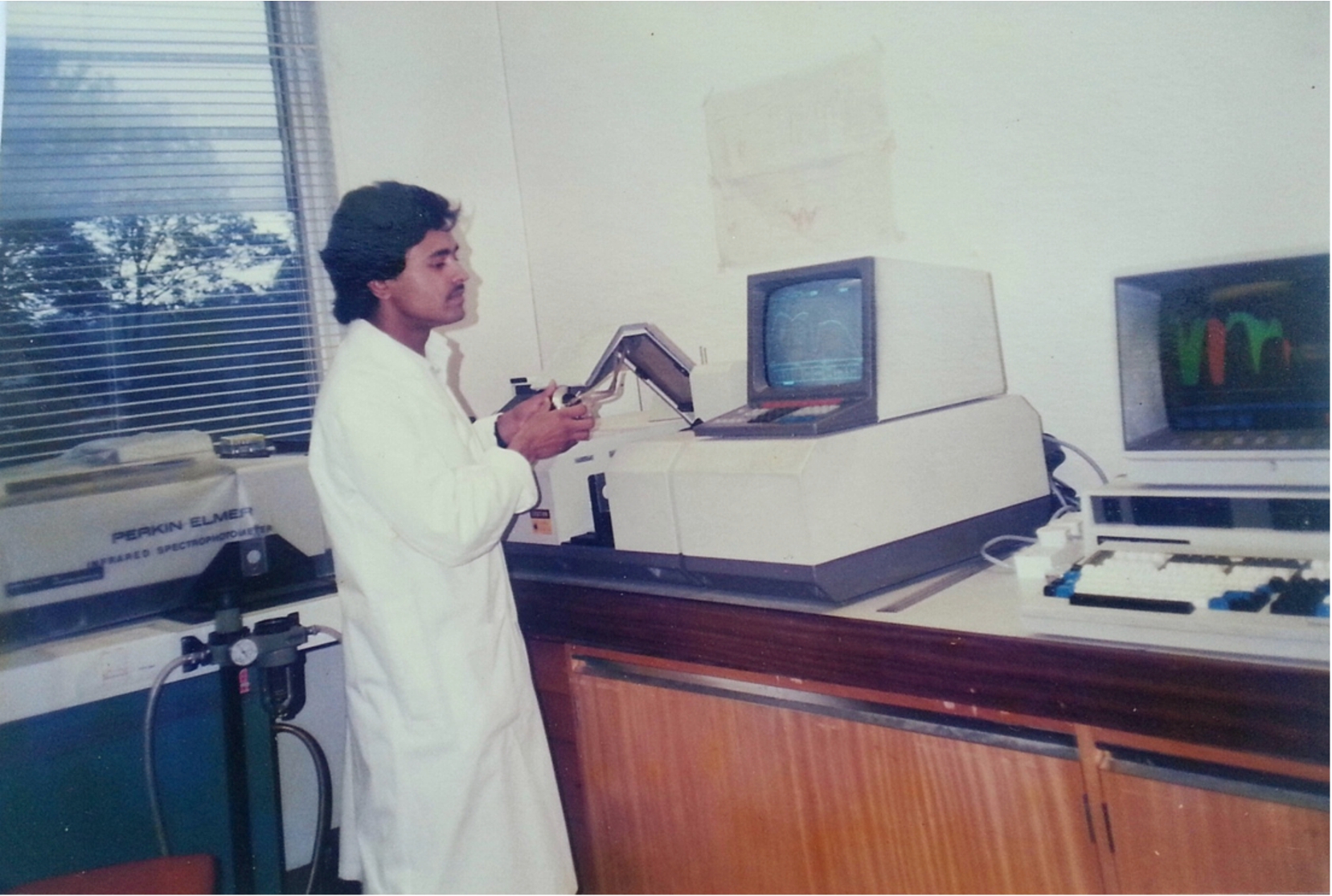 Author of this article recording FTIR spectra of H2O at the Royal Free Hospital School of Medicine, University of London. Spectra of H2O and 2H2O can be seen displayed on a computer attached to the FTIR spectrometer (photograph taken in 1987).