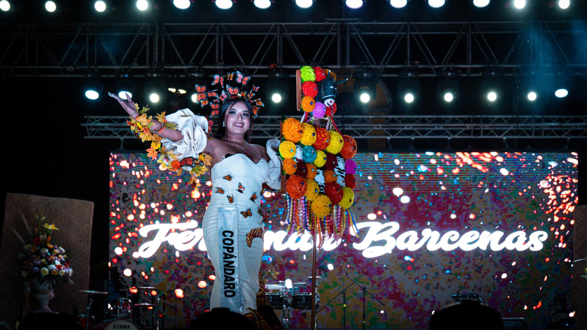 Monarch butterfly and Carnaval embroidered gown with traditional motifs.5