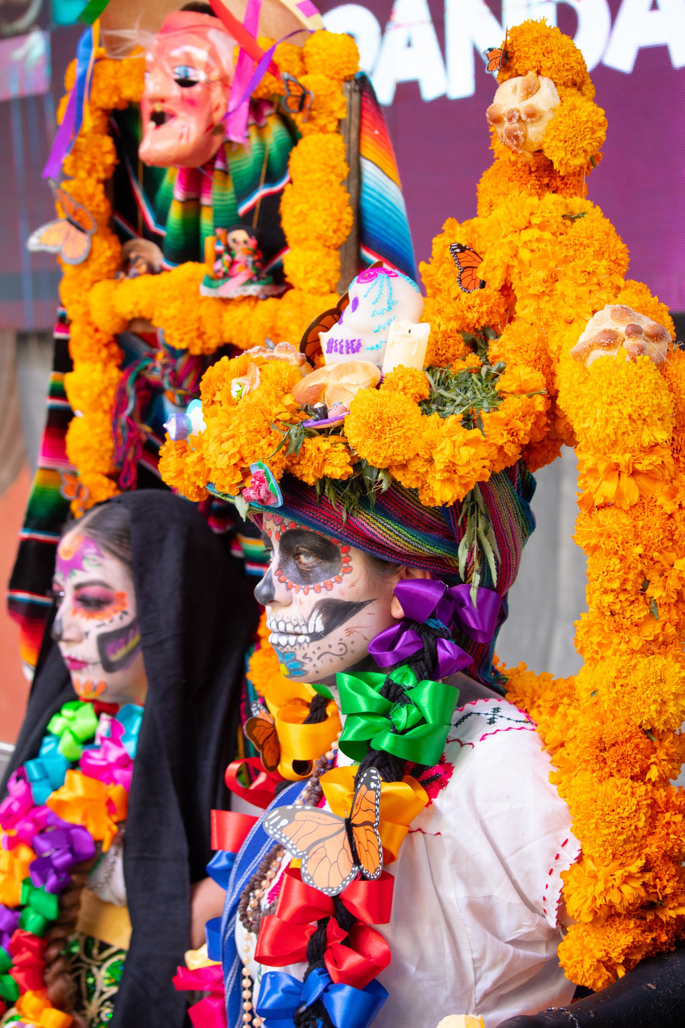 Close up of contestants running for best catrina costume during El Festival de las Almas y las Flores.7