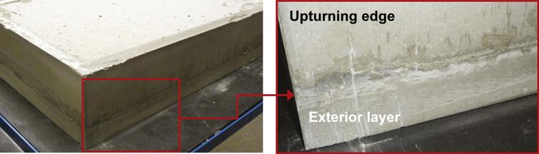 UHPC box manufactured with the two-step procedure: joint between exterior UHPC layer and upturning edges.