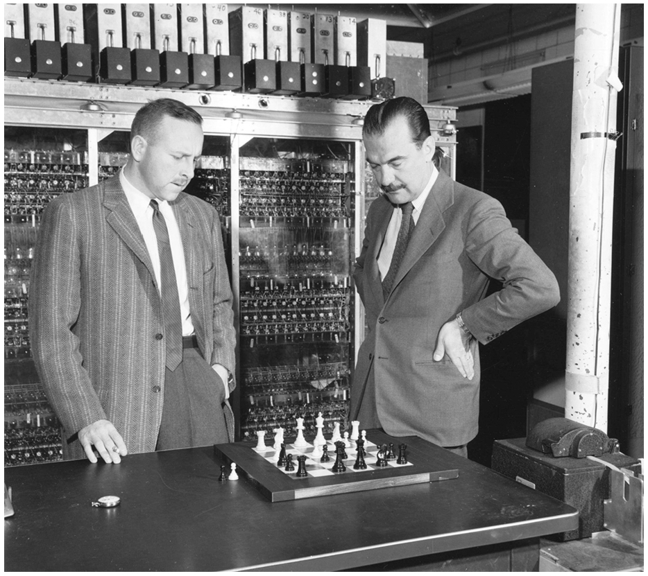 Paul Stein and Nick Metropolis play Los Alamos chess in front of MANIAC 1.