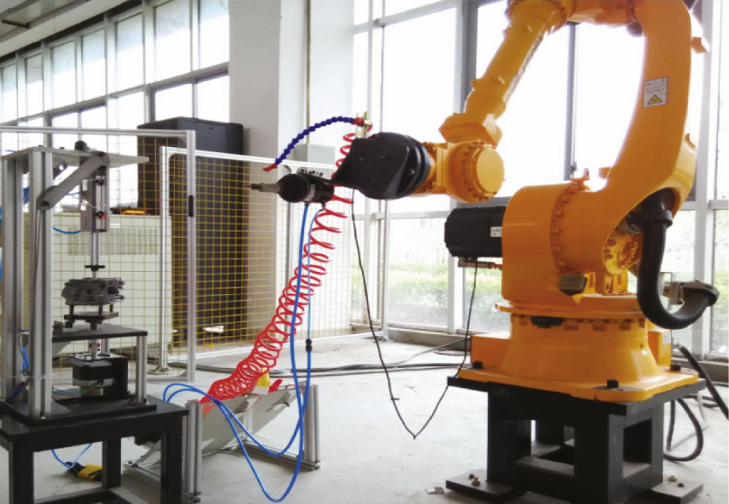 The deburring industrial robot system.