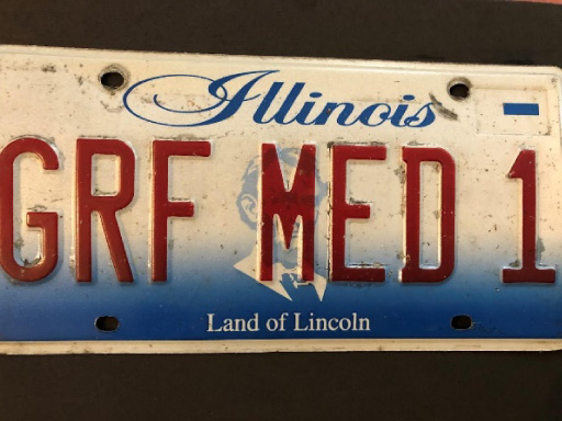 A license plate retired along with Grateful Med after many outreach miles in Illinois and Iowa. Photograph courtesy of Josophine Dorsch.