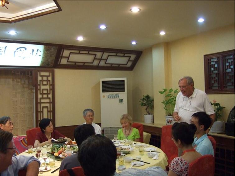 Jack Carpenter addresses the attendees at the conference dinner in Beijing during the first meeting of the Union of Compact Accelerator-driven Neutron sources. Sitting next to him are his wife Rhonda and his long-time collaborator Chun Loong.