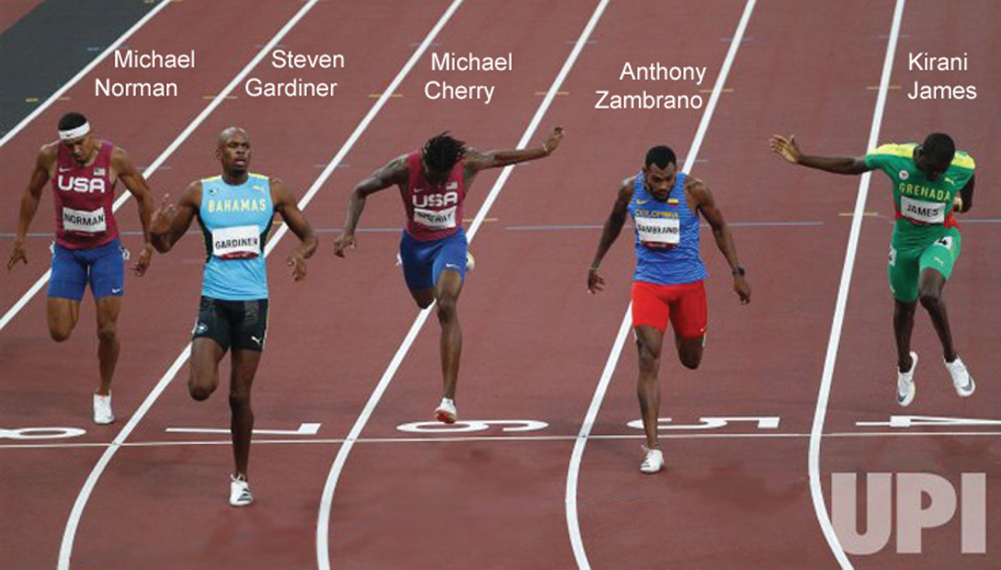 Kirani James of Grenada (right) finishes 0.02 seconds ahead of Michael Cherry (U.S.A.) and 0.12 seconds ahead of Michael Norman (U.S.A.) to win bronze in the men’s 400 meter run. Meanwhile, Anthony Zambrano (Columbia) wins silver, and Steven Gardiner (Bahamas) wins gold—thus elevating the Bahamas to 4th place in medals-per-capita, although if Gardiner had run 0.36 seconds slower he would not have won a medal. (Photo by Bob Strong, UPI.)