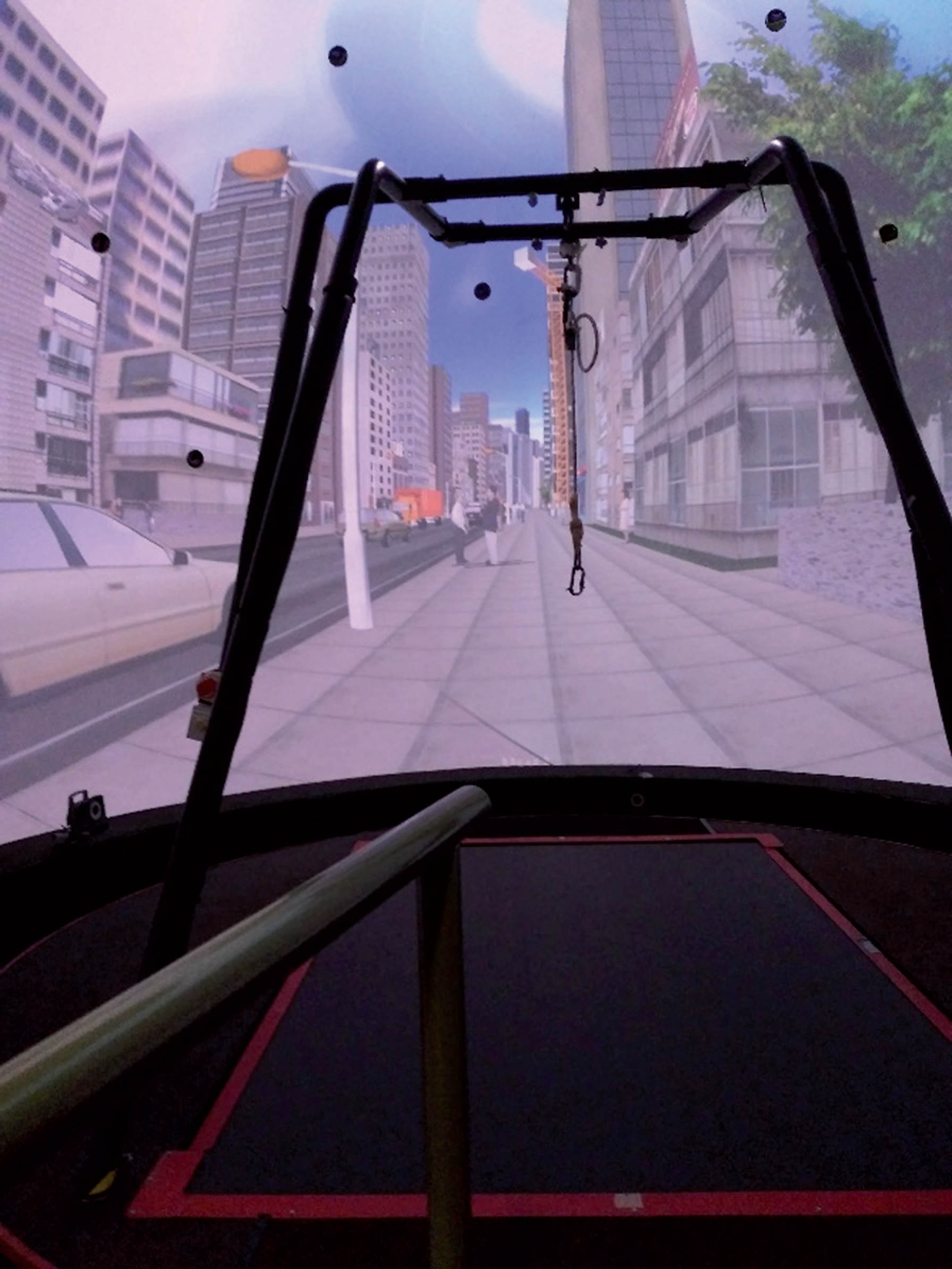 Virtual reality city scene in a Computerized Assisted Rehabilitation Environment for use during treatment of Mal de Debarquement Syndrome.